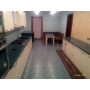 Столешница из акрилового камня с мойкой и барной стойкой